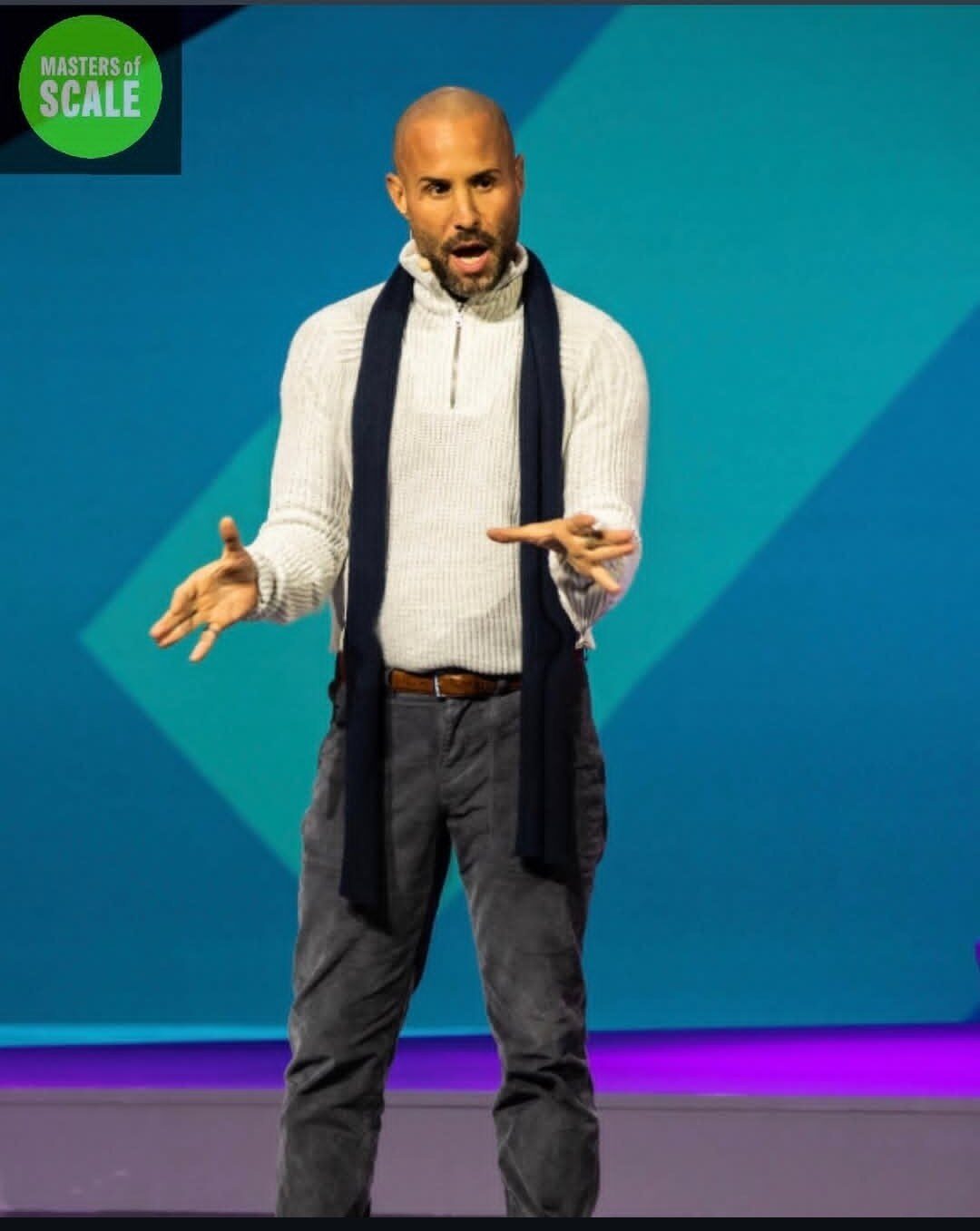 Mike J. Rosenfeld delivering a keynote on stage at Masters of Scale